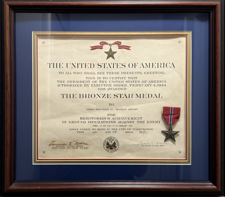 Bronze Star certificate shown in the book materials